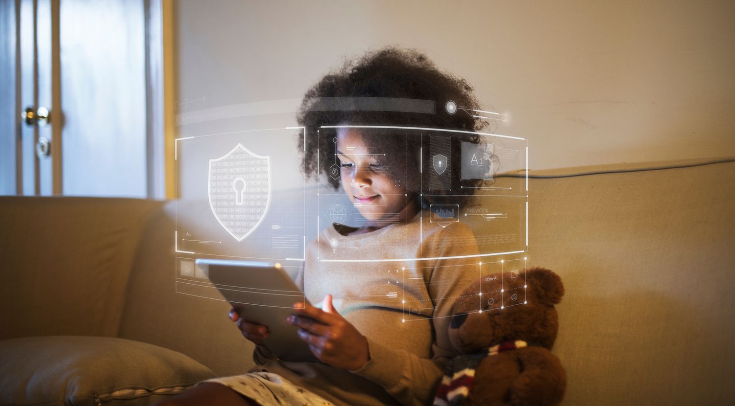 Girl using tablet with cyber security icons overlaid