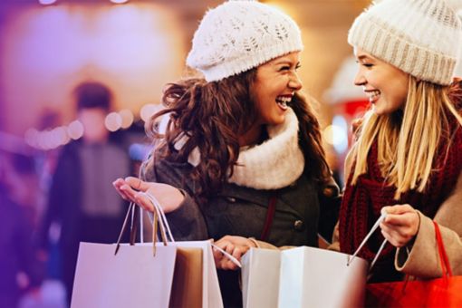 Two women shopping at Christmas