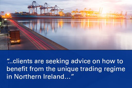 Image of Belfast City Hall with quote overlaid "Unfettered access to the GB market from Northern Ireland, combined with the continuation of tariff free trading with the EU...does bring potential benefits.” 