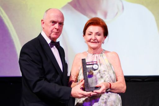 Breege O'Donoghue of Primark receives the Top 1000 Distinguished Leader in Business award from The Irish Times Managing Director, Liam Kavanagh.