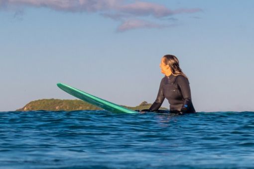 women on surf board