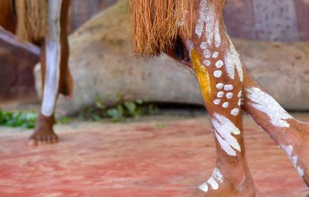 Painted legs of indigenous people