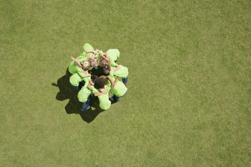 kids huddled in a circle