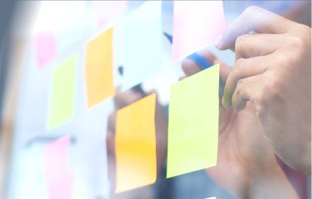 Employees mapping strategy on post-it notes