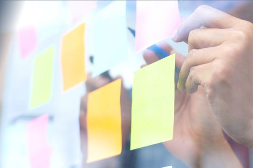 Employees mapping strategy on post-it notes
