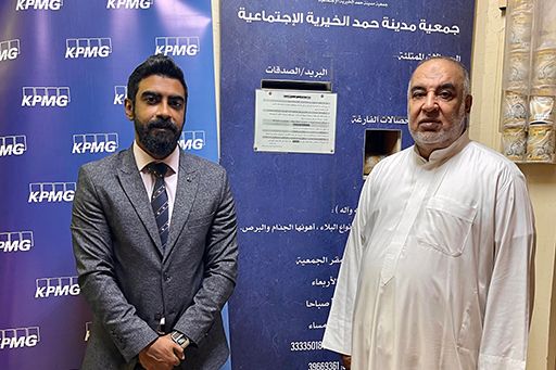 kpmg-laptop-donation-to-hamad-town-charity