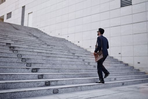 man-walking-on-stairs