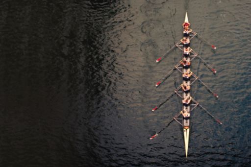 Rowing team on a river