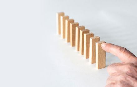 Line of wooden domino blocks