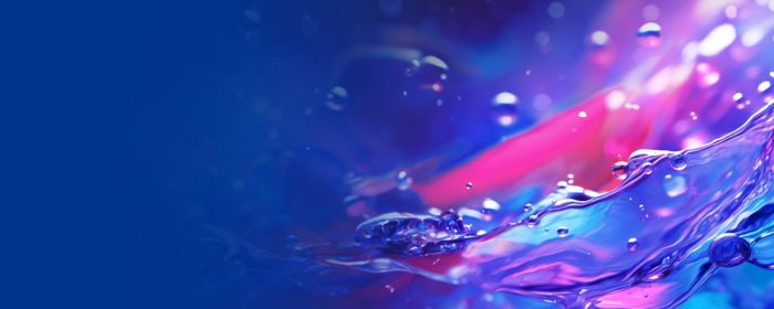 Pink and blue flowing water droplets