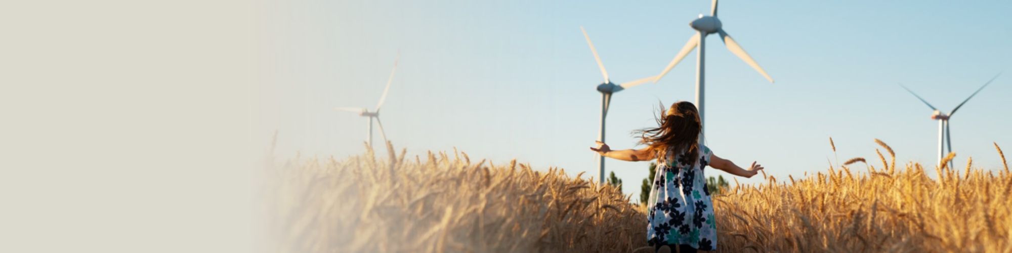 Girl running through field