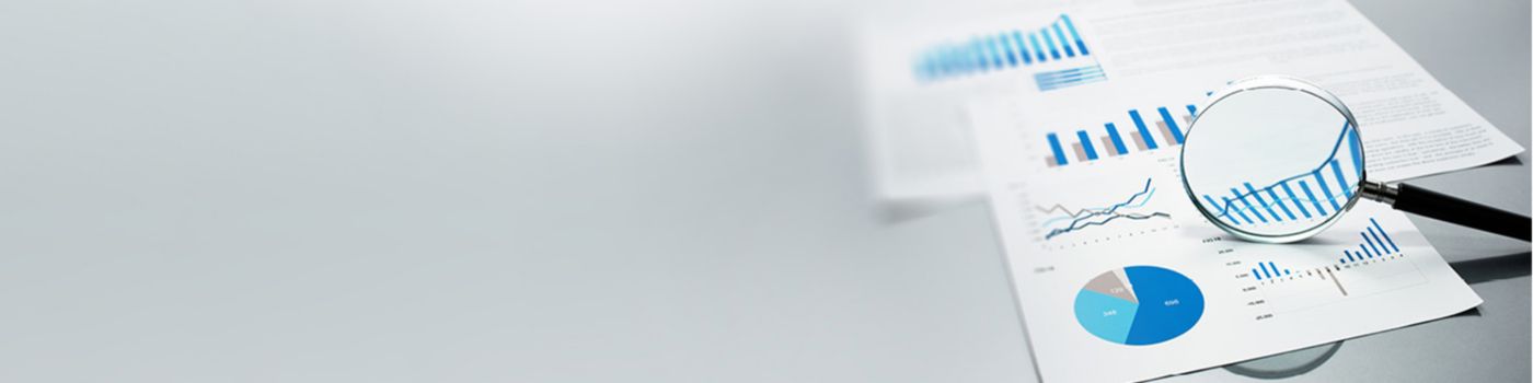 magnifying glass on documents