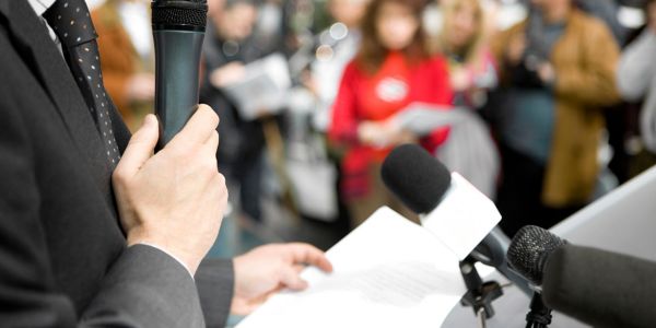 man in front of audience