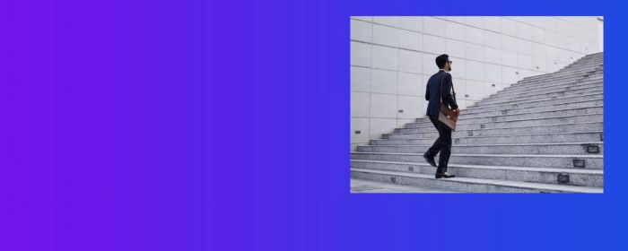 man in suit climbing stairs