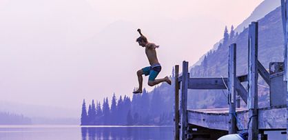 Man jumping into the river