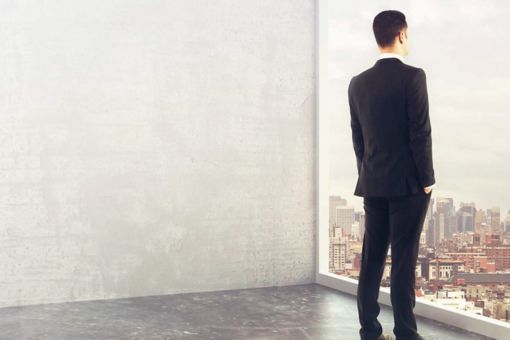 man looking at the window