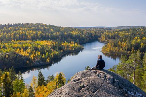 Man looking at lake