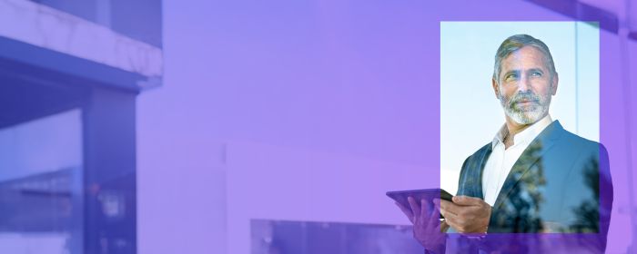 man looking out of window