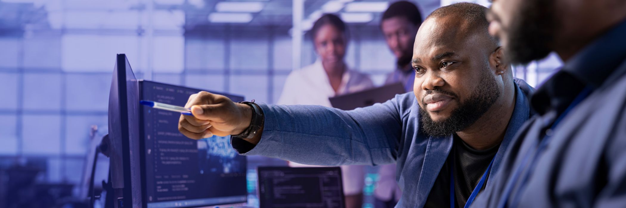 man pointing at screen