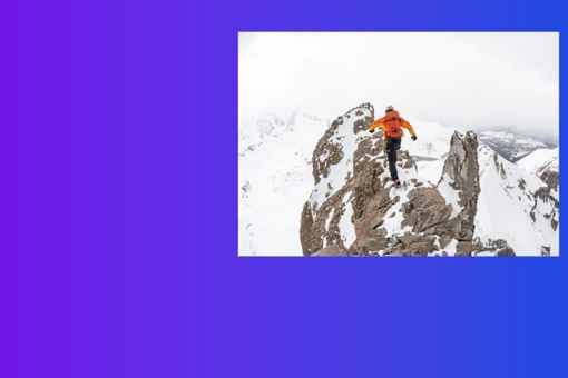 Man snow hiking on a mountain