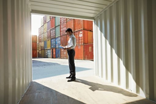 Man standing in container