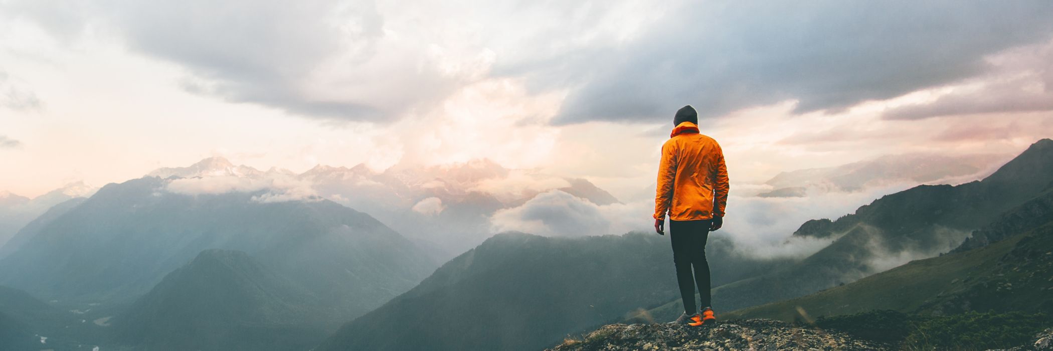 Man standing on mountain top