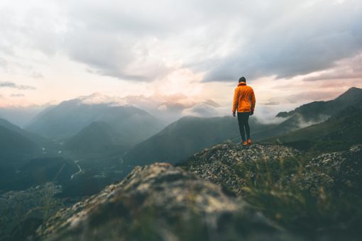 Man standing on mountain top