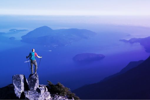 Man standing on mountain top