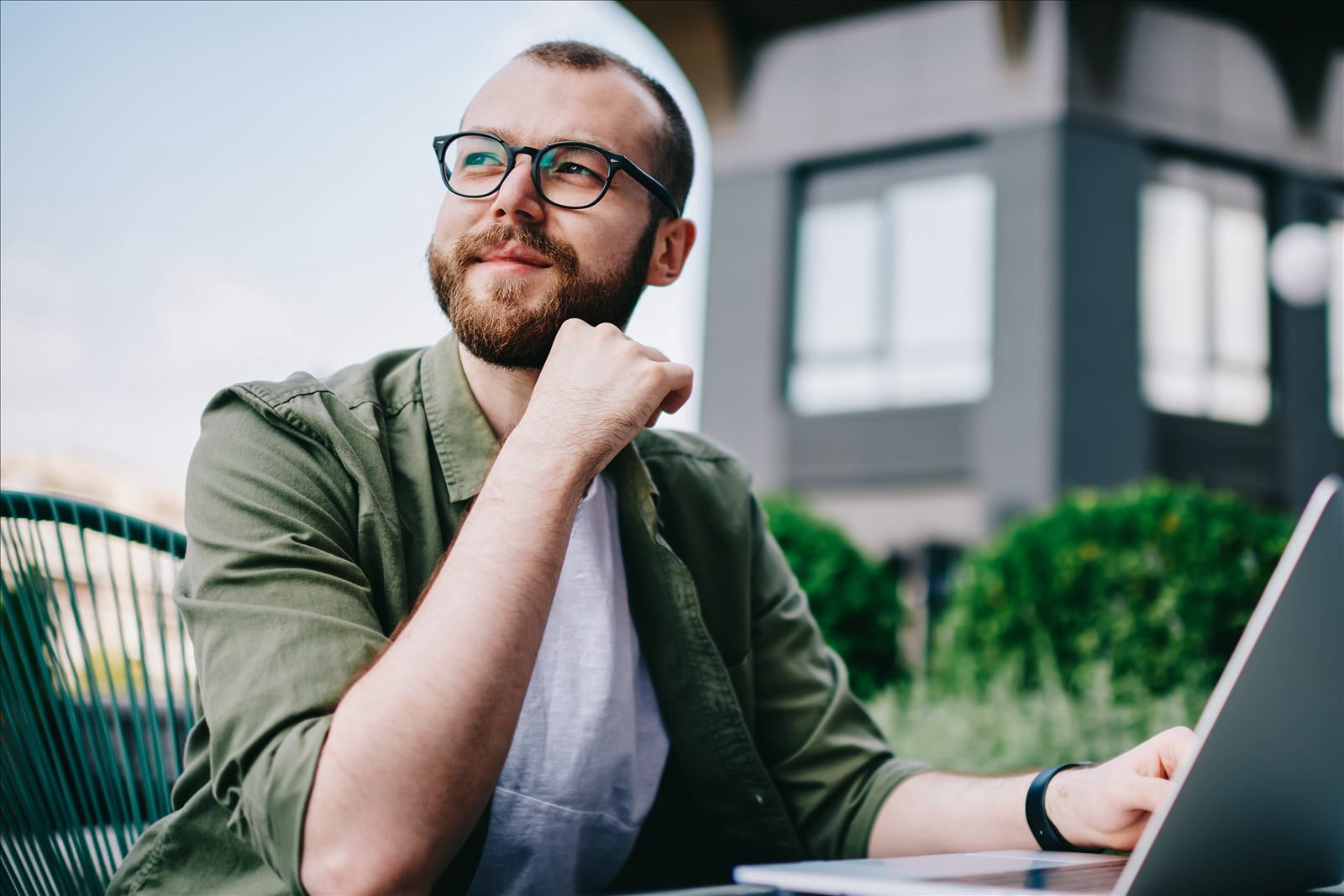  Man Thinking with Laptop