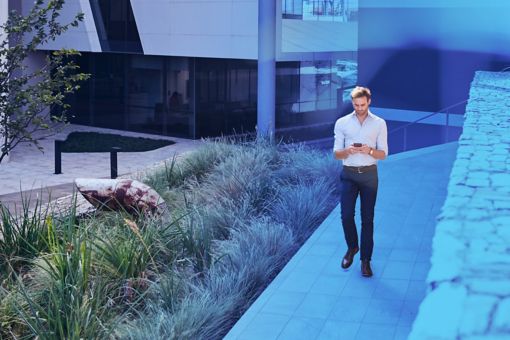 Image of a person looking at a mobile device