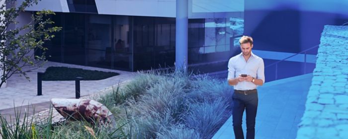 Image of a person looking at a mobile device