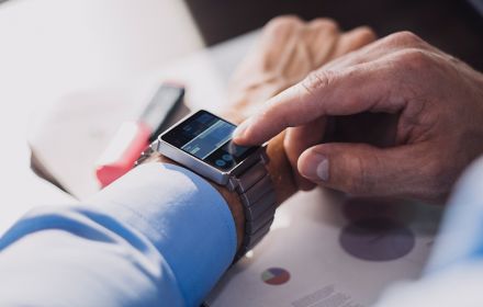 Man using smart watch on his wrist