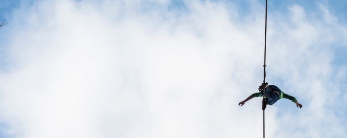 Man walking on rope