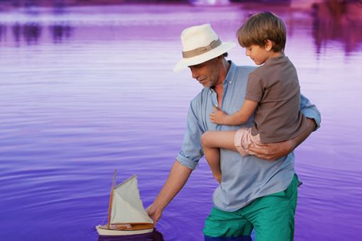 man-with-kid-boat