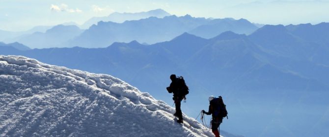 Men mountain walk snow