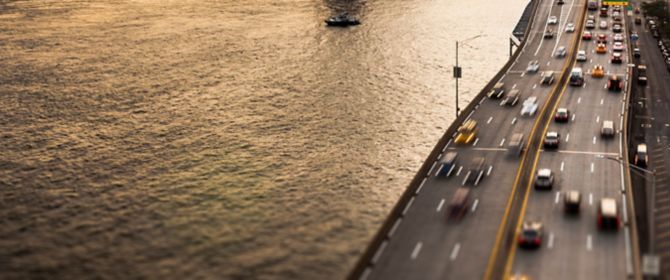 Moving traffic on road over sea