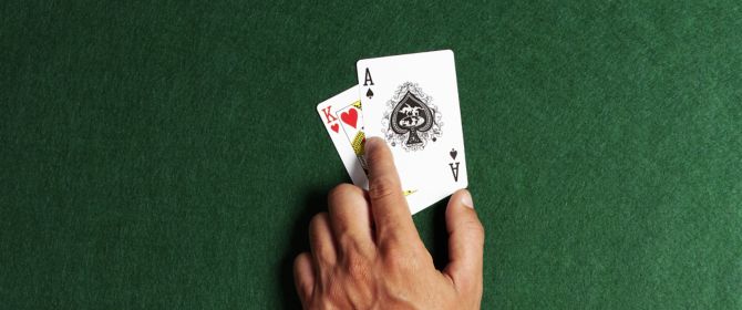 hand with game cards