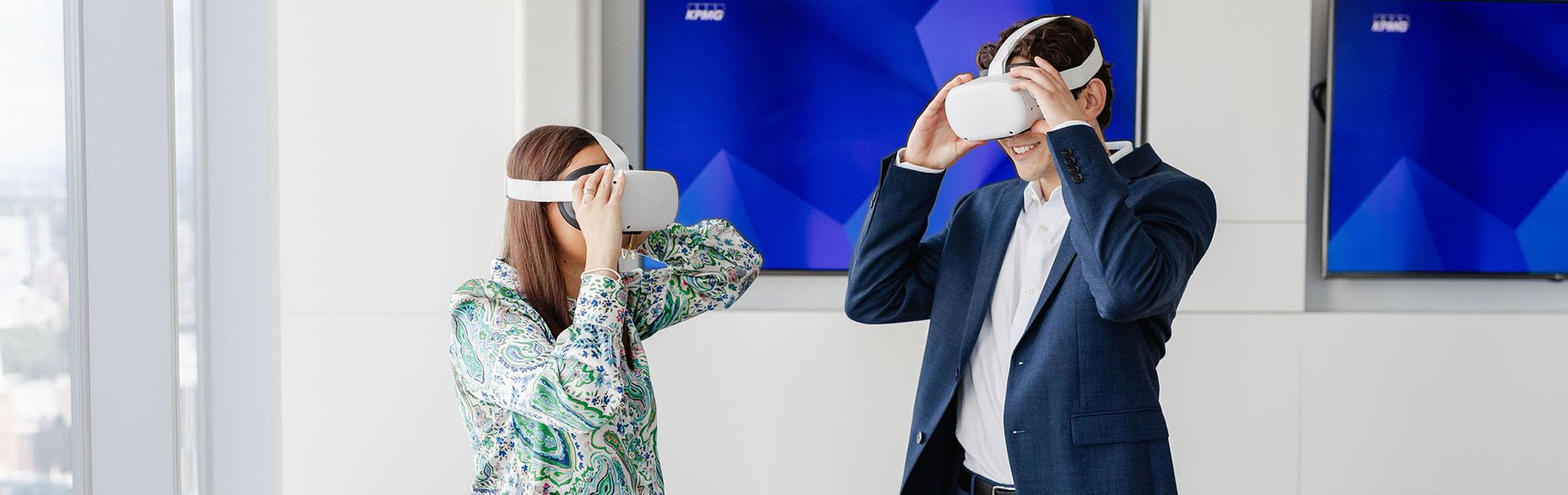 Business people looking at VR gear