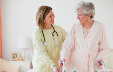 Nurse taking care of an elderly lady