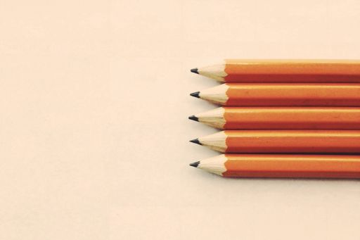 paper pencils aligned