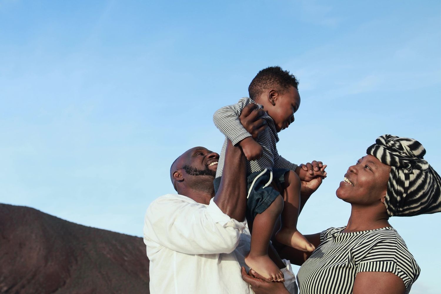 Parents holding child