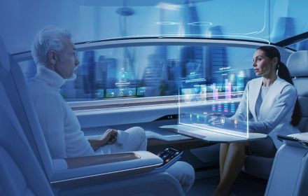 Business people meeting in driverless car