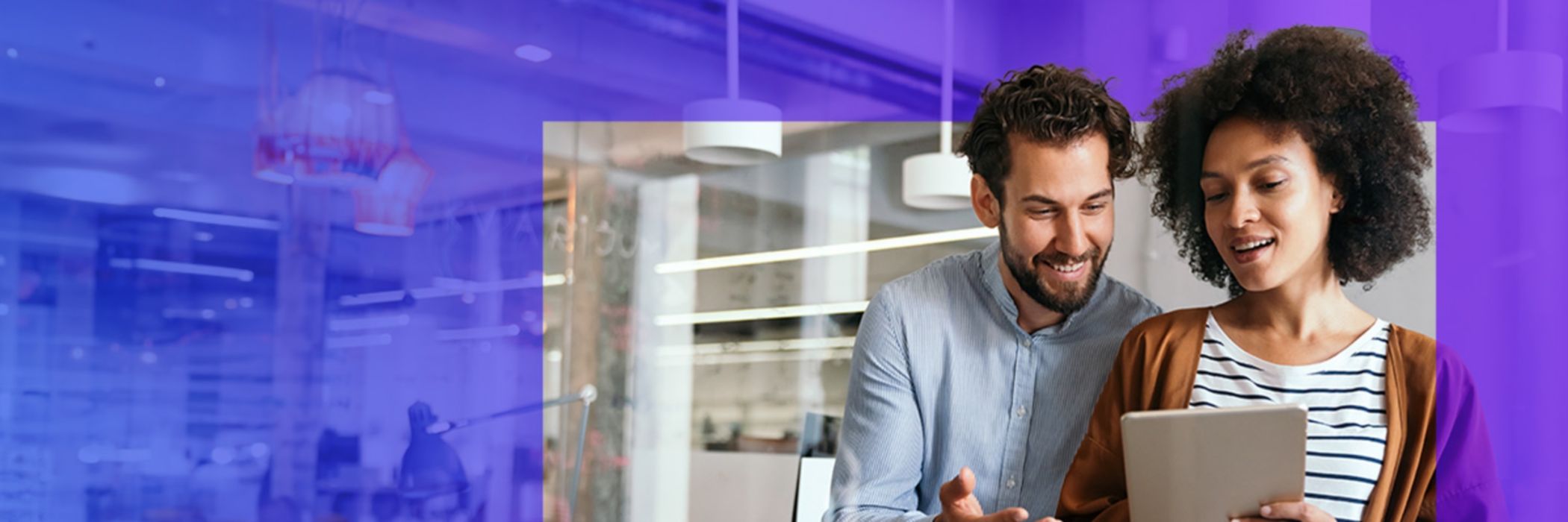 People looking at a tablet in an office with a purple overlay