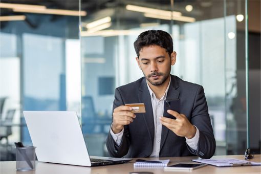 Person looking at the card