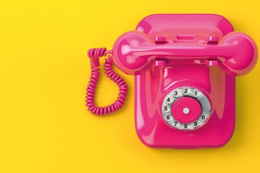 Pink and yellow telephone