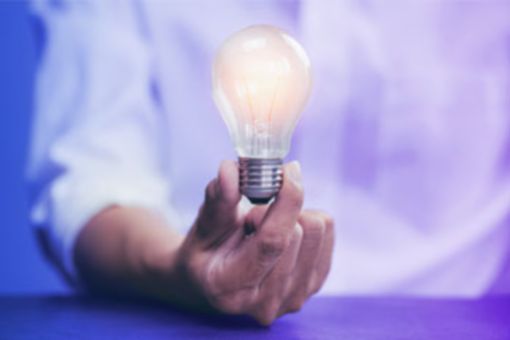 Man holding lightbulb