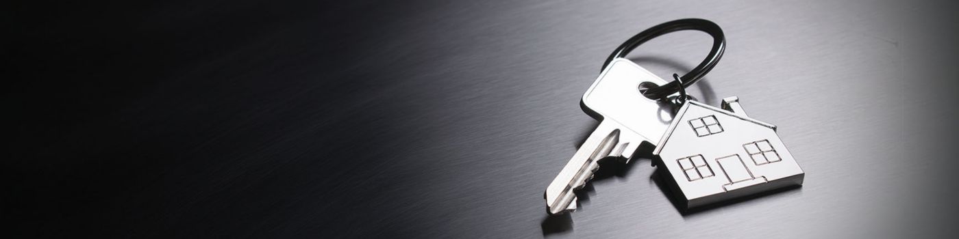 keys with a house shaped keychain