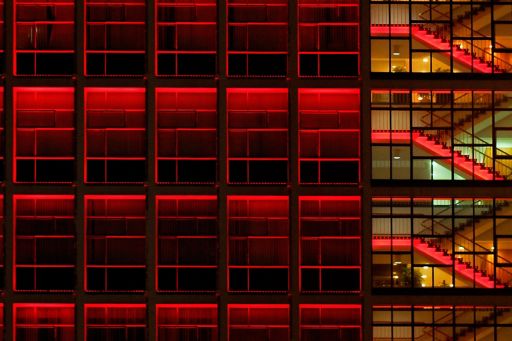 red lit glass building