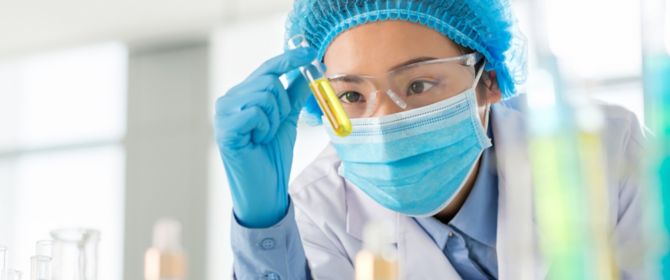 Science lab girl holding testtube