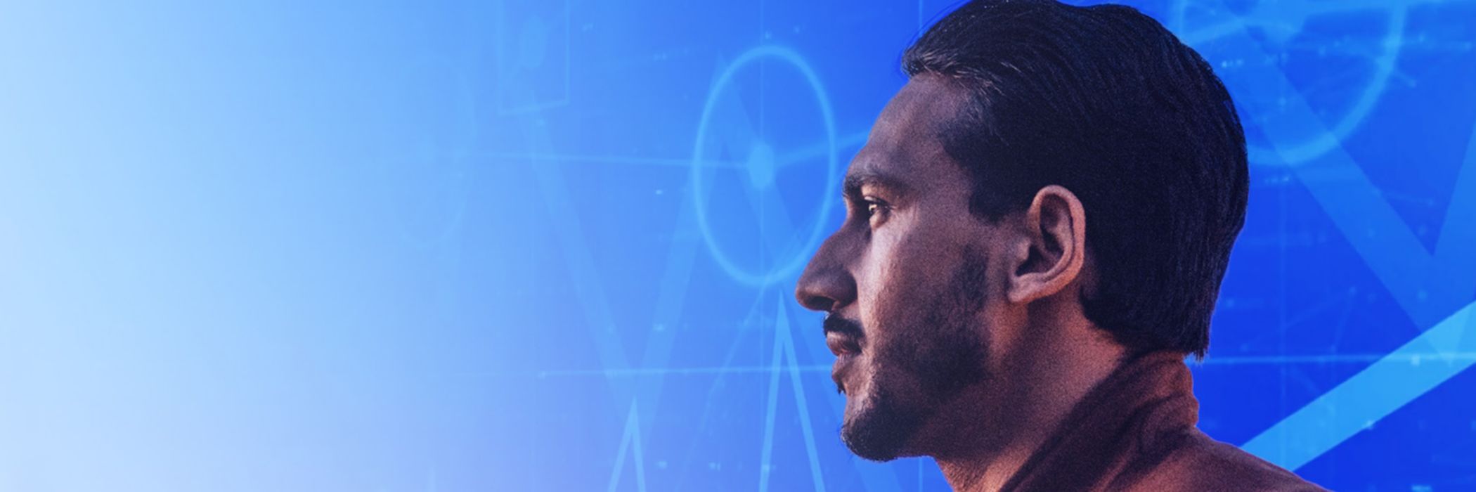 Side profile of man with data points moving behind